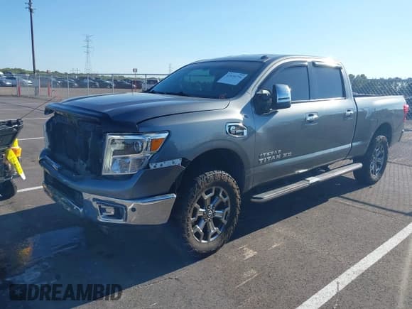 ✅ 2017 Nissan Titan SV • VIN: 1N6BA1F44HN573243 • Lot: 43434736. Wystawiony na IAAI z przebiegiem 129 031 mil. Bezpłatny archiwum sprzedaży aukcyjnych z USA i szczegółowy raport historii pojazdu na DreamBid. Zdjęcie 17.