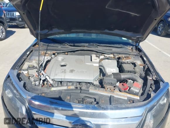 ✅ 2012 Ford Fusion Hybrid • VIN: 3FADP0L37CR221169 • Lot: 43415679. Listed on IAAI with 124,271 mi. Free auction sales archive from the USA and detailed vehicle history report at DreamBid. Image 10.