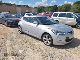 ✅ 2014 Hyundai Veloster • VIN: KMHTC6AD9EU192703 • Lot: 43275817. Wystawiony na IAAI z przebiegiem 134 361 mil. Bezpłatny archiwum sprzedaży aukcyjnych z USA i szczegółowy raport historii pojazdu na DreamBid. Zdjęcie 1.