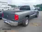 2006 Dodge Dakota SLT with VIN 1D7HE42N56S666276, listed as a IAAI auction lot 42697072 with 86,349 mi miles and . Bid and sale history available at DreamBid. Image 4.