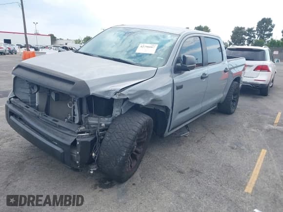 ✅ 2020 Toyota Tundra SR5 • VIN: 5TFEY5F15LX257663 • Lot: 42756667. Listed on IAAI with 64,961 mi. Free auction sales archive from the USA and detailed vehicle history report at DreamBid. Image 2.
