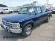 1992 Dodge Dakota z VIN 1B7GL23Y6NS508858, wystawiony jako IAAI lot #42380225 z przebiegiem 177 280 mil mil oraz . Historia ofert i sprzedaży dostępna na DreamBid. Obrazek 2.