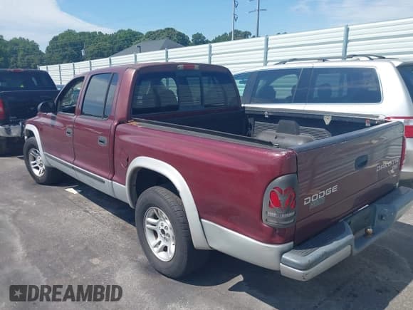 ✅ 2003 Dodge Dakota SLT • VIN: 1D7HL48X13S132234 • Lot: 43087429. Wystawiony na IAAI z przebiegiem 166 002 mil. Bezpłatny archiwum sprzedaży aukcyjnych z USA i szczegółowy raport historii pojazdu na DreamBid. Zdjęcie 3.