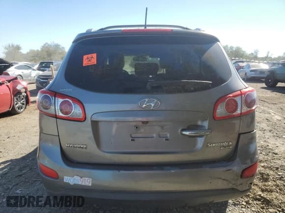 ✅ 2011 Hyundai Santa Fe Limited • VIN: 5XYZK3AB3BG044073 • Lot: 77100334. Listed on Copart with 216,892 mi. Free auction sales archive from the USA and detailed vehicle history report at DreamBid. Image 6.
