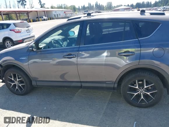✅ 2018 Toyota RAV4 Hybrid SE • VIN: JTMJJREV5JD250452 • Lot: 42839892. Listed on IAAI with 98,464 mi. Free auction sales archive from the USA and detailed vehicle history report at DreamBid. Image 15.