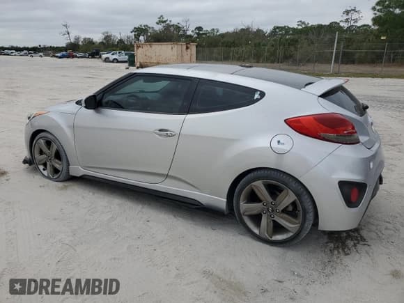 ✅ 2013 Hyundai Veloster Turbo • VIN: KMHTC6AE2DU099903 • Lot: 88582885. Wystawiony na Copart z przebiegiem 159 968 mil. Bezpłatny archiwum sprzedaży aukcyjnych z USA i szczegółowy raport historii pojazdu na DreamBid. Zdjęcie 2.