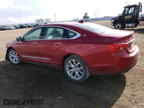 ✅ 2015 Chevrolet Impala LTZ • VIN: 2G1155SLXF9169590 • Лот: 51168084. Опубликован ранее на Copart с пробегом 129 613 миль. Бесплатный доступ к архиву аукционных продаж из США и подробный отчёт об истории автомобиля на DreamBid. Изображение 2.