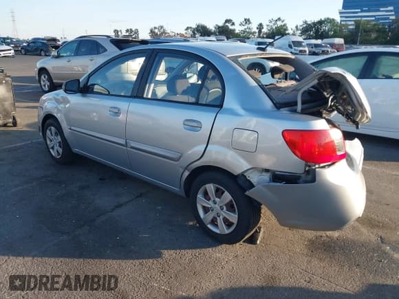 ✅ 2010 Kia Rio LX • VIN: KNADH4A38A6673706 • Lot: 43645629. Listed on IAAI with 145,094 mi. Free auction sales archive from the USA and detailed vehicle history report at DreamBid. Image 3.