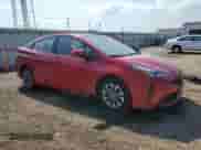 2021 Toyota Prius L Eco with VIN JTDKAMFU9M3134940, listed as a Copart auction lot 71632875 with 34,382 mi miles and Salvage title. Bid and sale history available at DreamBid. Image 4.