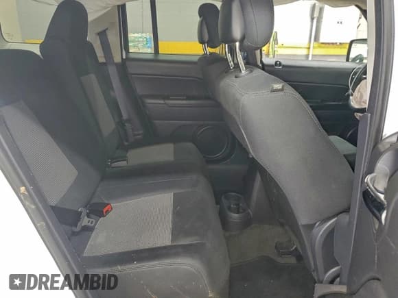 ✅ 2014 Jeep Patriot Latitude • VIN: 1C4NJRFB5ED784241 • Lot: 94932145. Listed on Copart with Not provided. Free auction sales archive from the USA and detailed vehicle history report at DreamBid. Image 11.