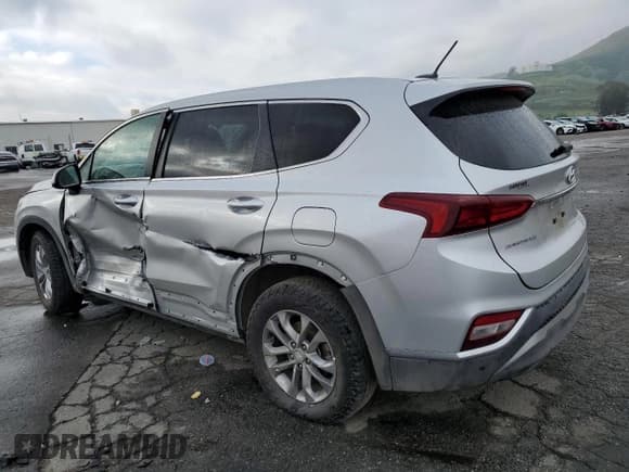 ✅ 2019 Hyundai Santa Fe SE • VIN: 5NMS2CAD5KH077021 • Lot: 43670733. Wystawiony na Copart z przebiegiem 67 064 mil. Bezpłatny archiwum sprzedaży aukcyjnych z USA i szczegółowy raport historii pojazdu na DreamBid. Zdjęcie 2.