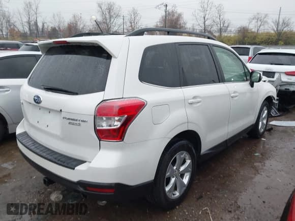 ✅ 2014 Subaru Forester Touring • VIN: JF2SJAMC9EH440535 • Lot: 43767184. Listed on IAAI with 120,462 mi. Free auction sales archive from the USA and detailed vehicle history report at DreamBid. Image 4.