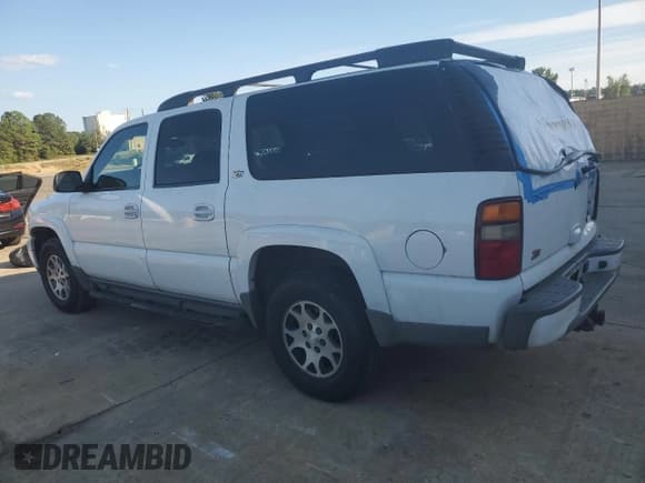 ✅ 2002 Chevrolet Suburban Z71 • VIN: 3GNFK16ZX2G216704 • Lot: 82005935. Listed on Copart with 296,826 mi. Free auction sales archive from the USA and detailed vehicle history report at DreamBid. Image 2.