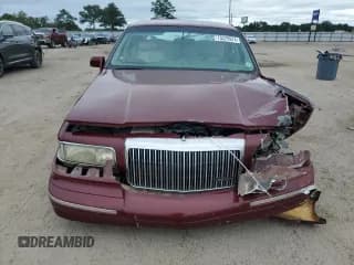 ✅ 1997 Lincoln Town Car Signature • VIN: 1LNLM82W5VY631705 • Lot: 70229974. Listed on Copart with 231,352 mi. Free auction sales archive from the USA and detailed vehicle history report at DreamBid. Image 5.