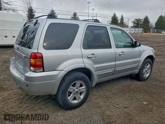 ✅ 2006 Ford Escape Hybrid • VIN: 1FMCU95H06KA31102 • Lot: 96157245. Listed on Copart with 161,532 mi. Free auction sales archive from the USA and detailed vehicle history report at DreamBid. Image 3.