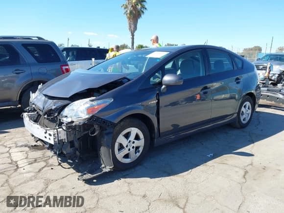 ✅ 2010 Toyota Prius II • VIN: JTDKN3DUXA1311049 • Lot: 43448699. Listed on IAAI with 127,244 mi. Free auction sales archive from the USA and detailed vehicle history report at DreamBid. Image 2.