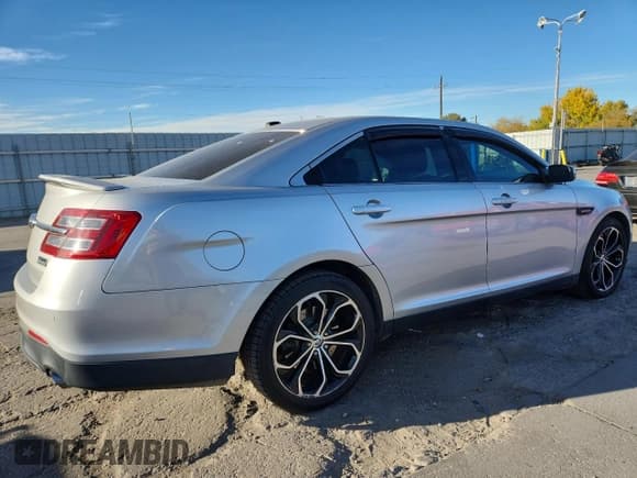 ✅ 2013 Ford Taurus SHO • VIN: 1FAHP2KT1DG112634 • Lot: 89816735. Listed on Copart with 124,134 mi. Free auction sales archive from the USA and detailed vehicle history report at DreamBid. Image 3.
