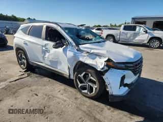 2022 Hyundai Tucson SEL with VIN 5NMJCCAE9NH018124, listed as a Copart auction lot 69767065 with 69,376 mi miles and Salvage title. Bid and sale history available at DreamBid. Image 4.