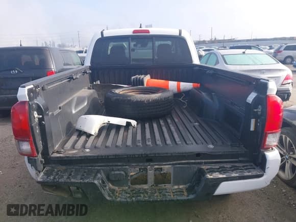 ✅ 2019 Toyota Tacoma SR • VIN: 5TFSX5EN0KX066774 • Lot: 41534797. Listed on IAAI with 153,172 mi. Free auction sales archive from the USA and detailed vehicle history report at DreamBid. Image 16.