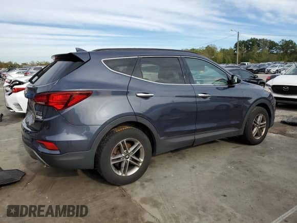 2017 Hyundai Santa Fe 2.4L z VIN 5NMZUDLB3HH025020, wystawiony jako Copart lot #84997425 z przebiegiem 139 041 mil mil oraz Szkoda całkowita • Salvage title. Historia ofert i sprzedaży dostępna na DreamBid. Obrazek 3.
