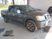 ✅ 2005 Nissan Titan LE • VIN: 1N6AA07B75N553857 • Lot: 42110183. Listed on IAAI with 166,064 mi. Free auction sales archive from the USA and detailed vehicle history report at DreamBid. Image 1.