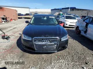 ✅ 2015 Audi A8 4.0T • VIN: WAU32AFDXFN034835 • Лот: 40891264. Опубликован ранее на Copart с пробегом 106 143 миль. Бесплатный доступ к архиву аукционных продаж из США и подробный отчёт об истории автомобиля на DreamBid. Изображение 5.