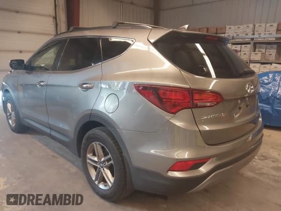 ✅ 2018 Hyundai Santa Fe 2.4L • VIN: 5NMZUDLB2JH072593 • Лот: 42846562. Опубликован ранее на IAAI с пробегом 56 789 миль. Бесплатный доступ к архиву аукционных продаж из США и подробный отчёт об истории автомобиля на DreamBid. Изображение 3.