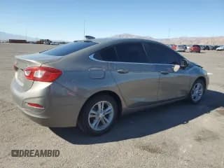 ✅ 2017 Chevrolet Cruze LT • VIN: 1G1BE5SM2H7210036 • Lot: 90130525. Listed on Copart with 66,230 mi. Free auction sales archive from the USA and detailed vehicle history report at DreamBid. Image 3.