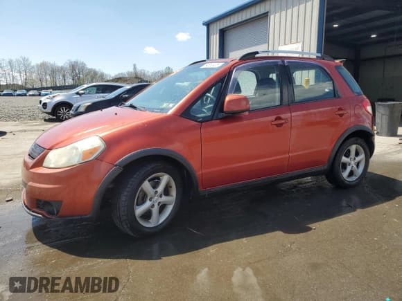 ✅ 2009 Suzuki SX4 Touring AWD • VIN: JS2YB417696202731 • Lot: 54552405. Listed on Copart with 75,446 mi. Free auction sales archive from the USA and detailed vehicle history report at DreamBid. Image 1.