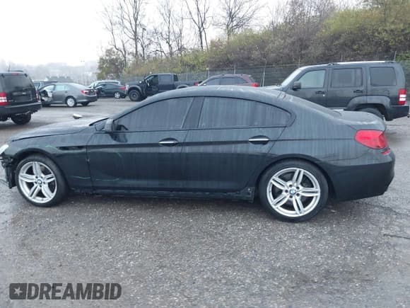 ✅ 2016 BMW 6 Series 640i xDrive • VIN: WBA6D2C59GGT65504 • Lot: 43792697. Wystawiony na IAAI z przebiegiem 79 905 mil. Bezpłatny archiwum sprzedaży aukcyjnych z USA i szczegółowy raport historii pojazdu na DreamBid. Zdjęcie 15.