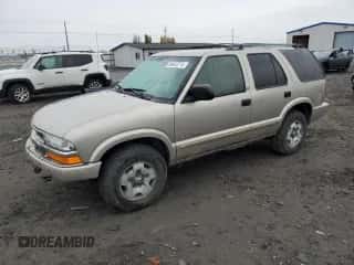 2002 Chevrolet Blazer LS z VIN 1GNDT13W02K155161, wystawiony jako Copart lot #80033774 z przebiegiem 145 425 mil mil oraz Szkoda całkowita • Salvage title. Historia ofert i sprzedaży dostępna na DreamBid. Obrazek 1.