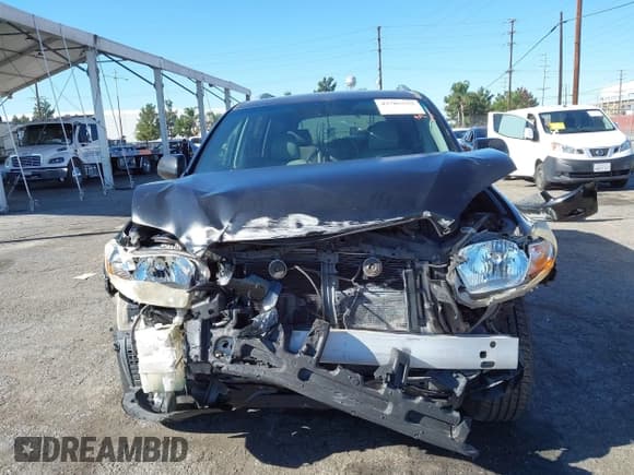 ✅ 2010 Toyota Highlander Limited • VIN: JTEJW3EHXA2045175 • Lot: 43785532. Listed on IAAI with 210,781 mi. Free auction sales archive from the USA and detailed vehicle history report at DreamBid. Image 13.
