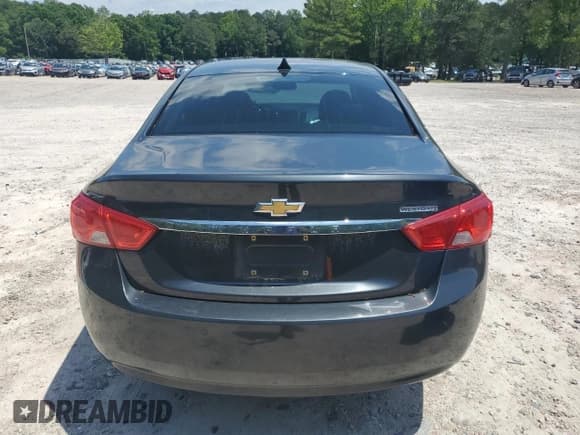 ✅ 2014 Chevrolet Impala LT • VIN: 2G1115SL1E9291216 • Лот: 56163445. Опубликован ранее на Copart с пробегом 215 747 миль. Бесплатный доступ к архиву аукционных продаж из США и подробный отчёт об истории автомобиля на DreamBid. Изображение 6.