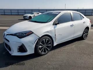 ✅ 2018 Toyota Corolla LE • VIN: 2T1BURHE3JC007422 • Lot: 82711035. Listed on Copart with 100,617 mi. Free auction sales archive from the USA and detailed vehicle history report at DreamBid. Image 1.
