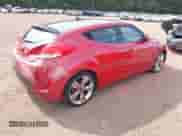 2013 Hyundai Veloster w/Black Int с VIN KMHTC6AD3DU099707, выставлен на аукционе IAAI как лот 43076379 с пробегом 128 517 миль миль и . История ставок и продаж доступна на DreamBid. Изображение 4.