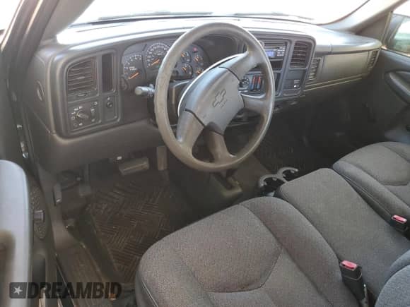 2004 Chevrolet Silverado 1500 Work Truck z VIN 1GCEK14V44Z262570, wystawiony jako Copart lot #76862394 z przebiegiem 138 432 mil mil oraz Szkoda całkowita • Salvage title. Historia ofert i sprzedaży dostępna na DreamBid. Obrazek 8.