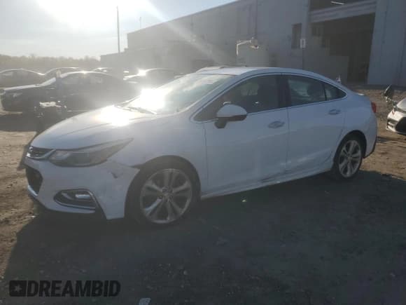 ✅ 2016 Chevrolet Cruze Premier • VIN: 1G1BG5SM9G7290993 • Lot: 89860365. Wystawiony na Copart z przebiegiem 136 118 mil. Bezpłatny archiwum sprzedaży aukcyjnych z USA i szczegółowy raport historii pojazdu na DreamBid. Zdjęcie 1.