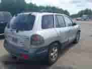 2005 Hyundai Santa Fe GLS z VIN KM8SC73EX5U995981, wystawiony jako IAAI lot #42472107 z przebiegiem 140 419 mil mil oraz . Historia ofert i sprzedaży dostępna na DreamBid. Obrazek 4.