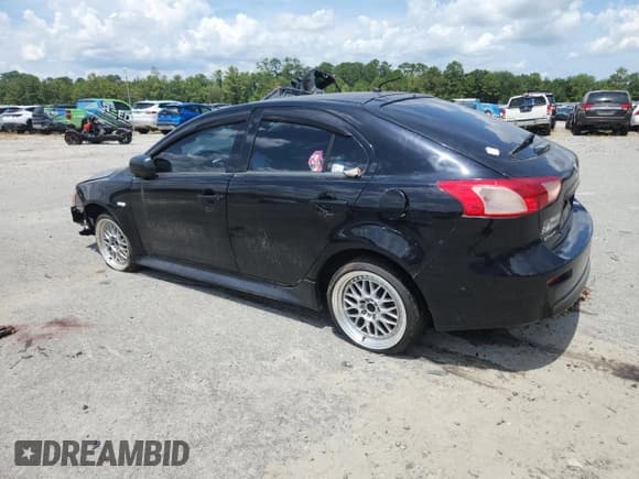 ✅ 2014 Mitsubishi Lancer ES • VIN: JA32X2HU7EU011678 • Lot: 63856245. Listed on Copart with 78,900 mi. Free auction sales archive from the USA and detailed vehicle history report at DreamBid. Image 2.