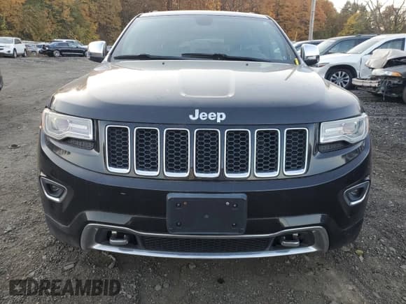 ✅ 2015 Jeep Grand Cherokee Overland • VIN: 1C4RJFCM7FC791589 • Lot: 77454564. Listed on Copart with 128,100 mi. Free auction sales archive from the USA and detailed vehicle history report at DreamBid. Image 5.