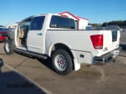 ✅ 2009 Nissan Titan LE • VIN: 1N6BA07D79N318614 • Lot: 43460475. Listed on IAAI with 232,157 mi. Free auction sales archive from the USA and detailed vehicle history report at DreamBid. Image 3.
