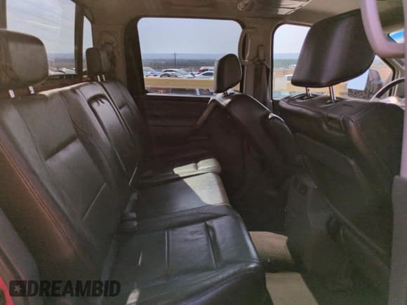 ✅ 2005 Nissan Titan LE • VIN: 1N6AA07A15N505049 • Lot: 69062495. Listed on Copart with 184,279 mi. Free auction sales archive from the USA and detailed vehicle history report at DreamBid. Image 10.