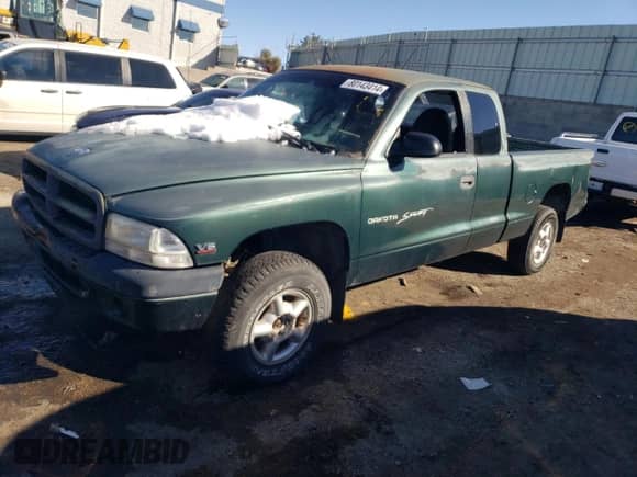 1999 Dodge Dakota SLT z VIN 1B7GG22X0XS239398, wystawiony jako Copart lot #80143414 z przebiegiem 147 646 mil mil oraz Szkoda całkowita • Salvage title. Historia ofert i sprzedaży dostępna na DreamBid. Obrazek 1.