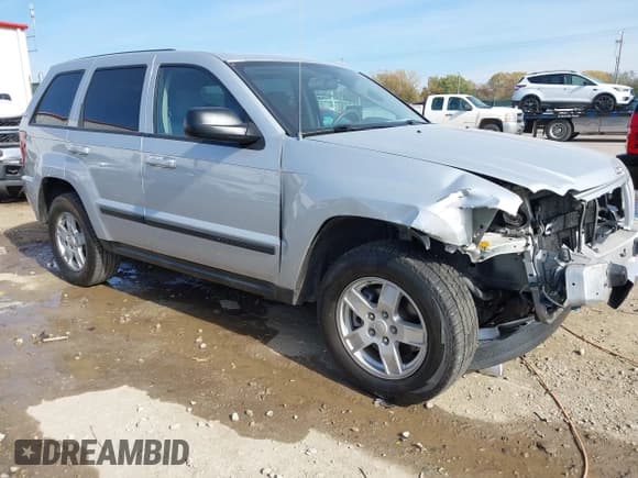✅ 2007 Jeep Grand Cherokee Laredo • VIN: 1J8GS48K87C663341 • Лот: 43636740. Опубликован ранее на IAAI с пробегом 198 156 миль. Бесплатный доступ к архиву аукционных продаж из США и подробный отчёт об истории автомобиля на DreamBid. Изображение 1.