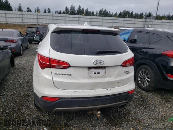 ✅ 2016 Hyundai Santa Fe • VIN: 5XYZTDLB5GG329848 • Лот: 42583643. Опубликован ранее на Copart с пробегом Не указан. Бесплатный доступ к архиву аукционных продаж из США и подробный отчёт об истории автомобиля на DreamBid. Изображение 6.