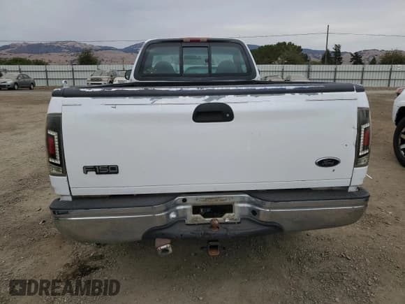 ✅ 1999 Ford F-150 XL • VIN: 1FTRF17L3XKA66147 • Lot: 69105514. Wystawiony na Copart z przebiegiem 179 426 mil. Bezpłatny archiwum sprzedaży aukcyjnych z USA i szczegółowy raport historii pojazdu na DreamBid. Zdjęcie 6.