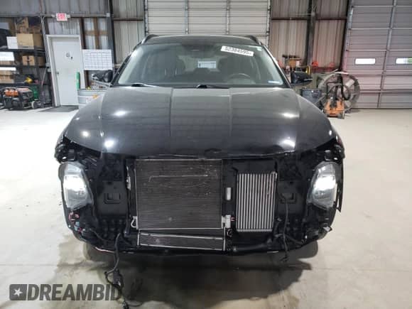 2023 Hyundai Tucson Blue z VIN KM8JBCA11PU096839, wystawiony jako Copart lot #52384595 z przebiegiem 32 983 mil mil oraz Szkoda całkowita • Salvage title. Historia ofert i sprzedaży dostępna na DreamBid. Obrazek 5.