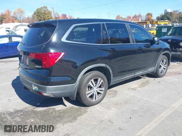 ✅ 2017 Honda Pilot EX-L • VIN: 5FNYF6H51HB033722 • Lot: 43594503. Listed on IAAI with 146,016 mi. Free auction sales archive from the USA and detailed vehicle history report at DreamBid. Image 4.