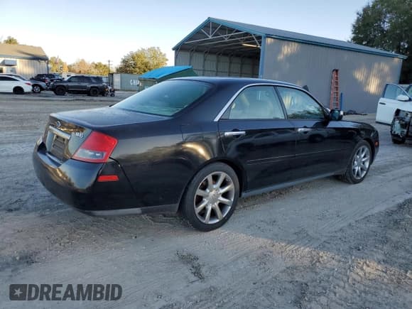 ✅ 2003 Infiniti M • VIN: JNKAY41E43M002876 • Lot: 85102004. Listed on Copart with 99,485 mi. Free auction sales archive from the USA and detailed vehicle history report at DreamBid. Image 3.