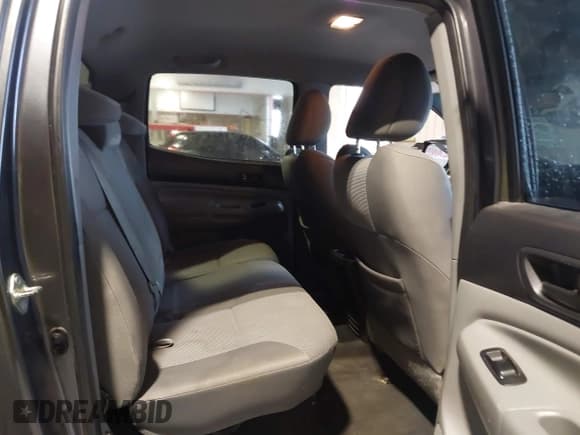 ✅ 2015 Toyota Tacoma • VIN: 3TMLU4EN9FM164933 • Lot: 41447209. Listed on IAAI with 248,613 mi. Free auction sales archive from the USA and detailed vehicle history report at DreamBid. Image 8.